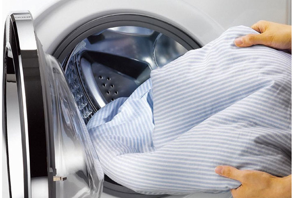 Lượng quần áo - Cách bảo quản máy giặt lâu bền hơn 10 năm